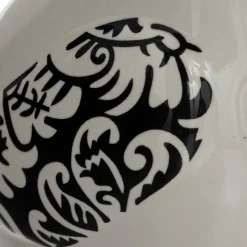 Estatua de pájaro blanco y negro de cerámica