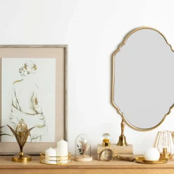 Lámpara de mesa MADI de metal dorado