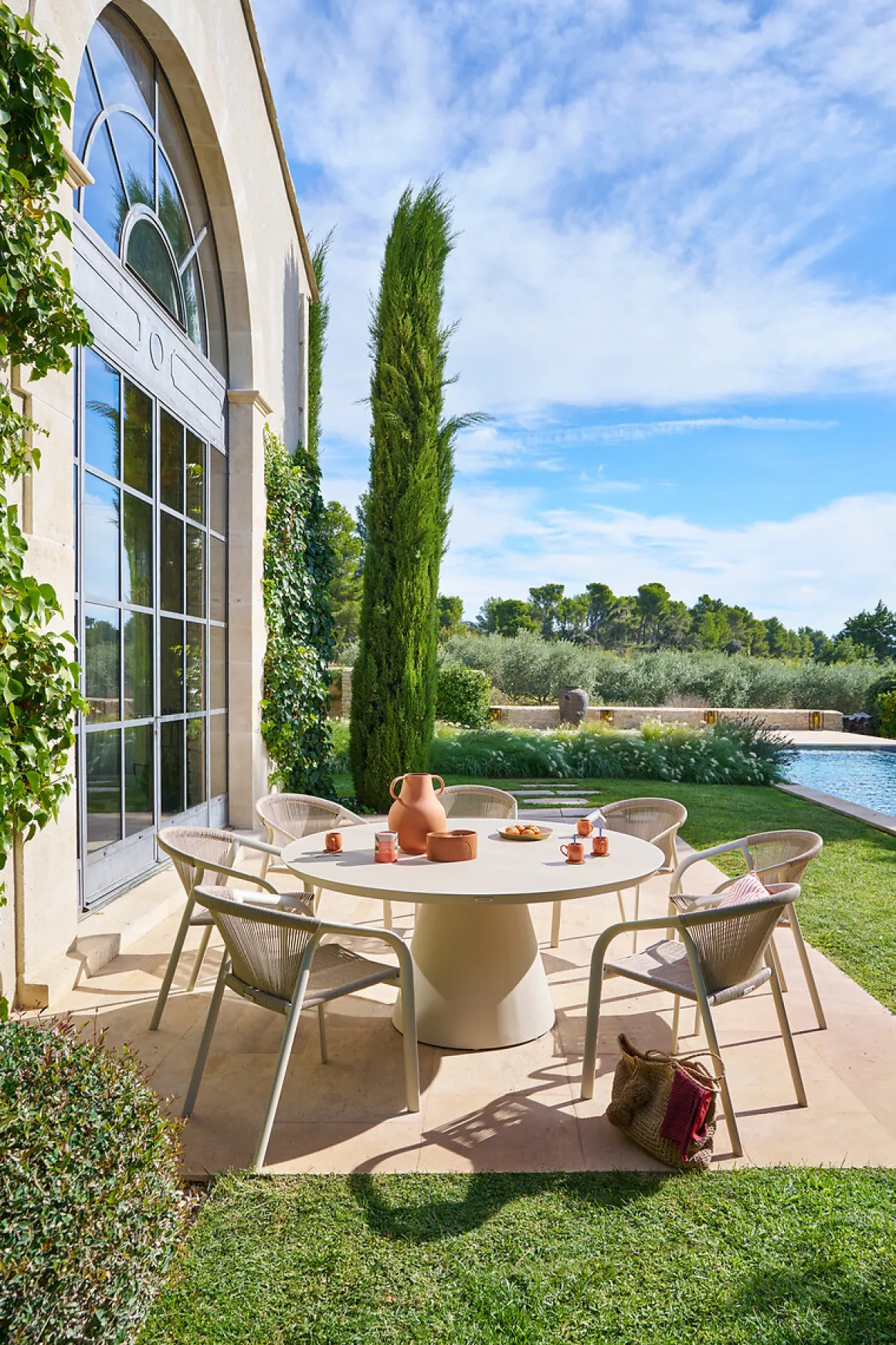 Mesa de exterior redonda YCONIA de aluminio